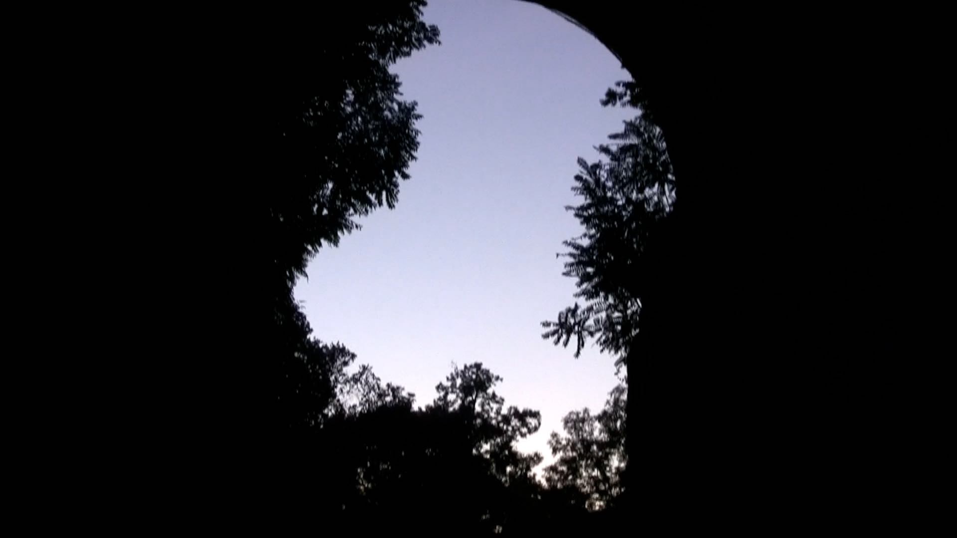 sky under a bridge at sunset